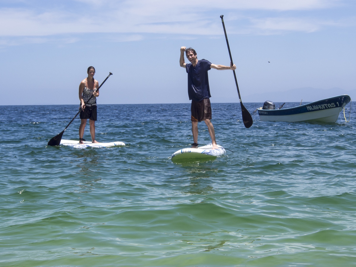 Erin and Simon paddleboarding in Mexico